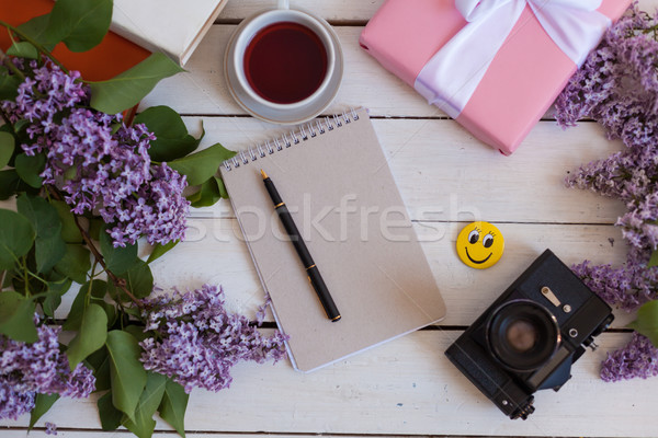 Fehér asztal orgona notebook kamera ajándék Stock fotó © dmitriisimakov