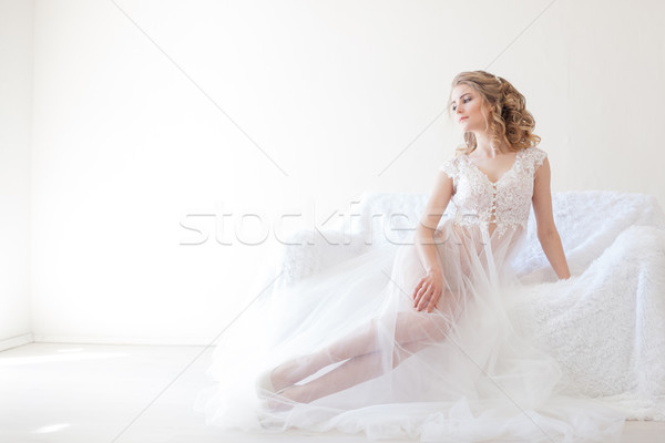 Piękna dziewczyna bielizna posiedzenia biały kanapie ślub Zdjęcia stock © dmitriisimakov