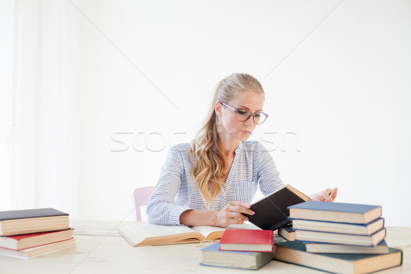 the teacher reads a book in the library business woman Stock photo © dmitriisimakov