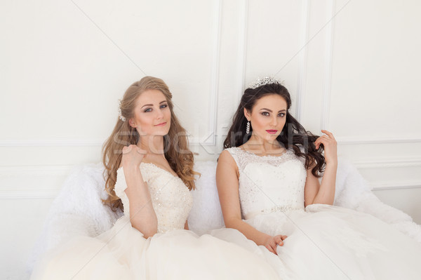 Portré kettő fiatal nők esküvő ruhák fehér Stock fotó © dmitriisimakov