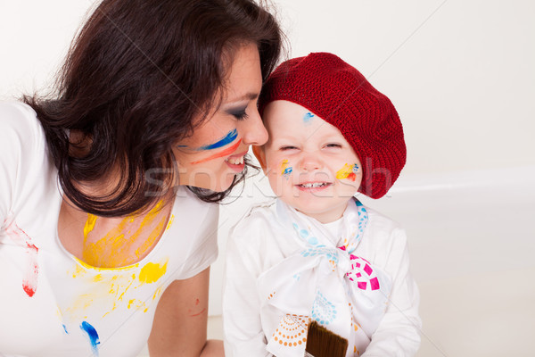 mother and little boy paints when painted Stock photo © dmitriisimakov