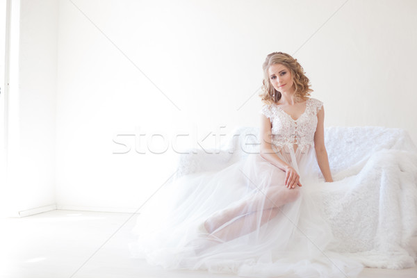 Schöne Mädchen Dessous Sitzung weiß Couch Hochzeit Stock foto © dmitriisimakov