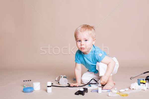 a boy plays in doctor medicine hospital Stock photo © dmitriisimakov