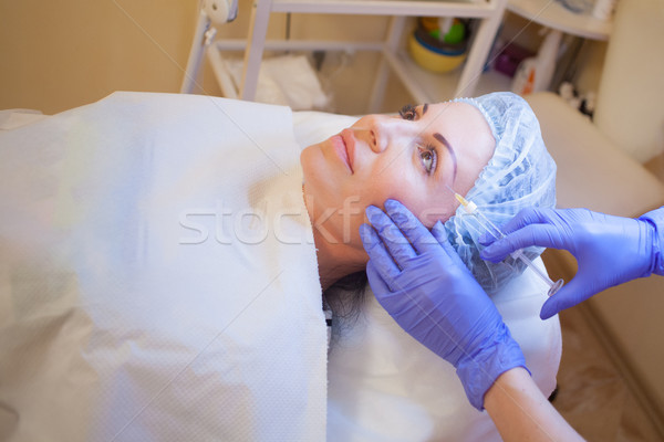 Orvos ajak beteg injekció injekciós tű fürdő Stock fotó © dmitriisimakov
