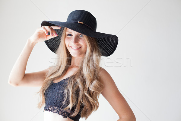 fashionable girl blonde with blue eyes in a hat with a brim Stock photo © dmitriisimakov