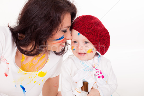 mother and little boy paints when painted Stock photo © dmitriisimakov