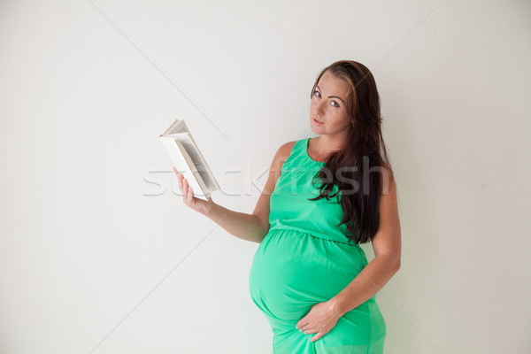 Terhes nő olvas könyv szülés lány egészség Stock fotó © dmitriisimakov