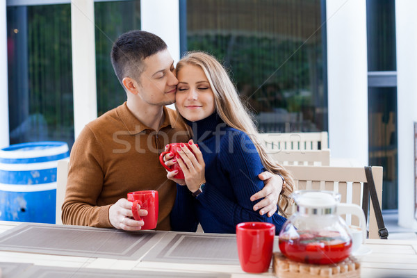 Marito moglie vacanze bere cioccolata calda caffè Foto d'archivio © dmitriisimakov