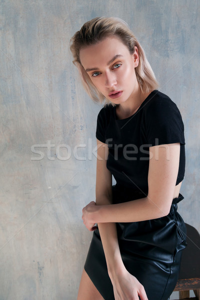 Portrait of a woman blonde on a light background Stock photo © dmitriisimakov