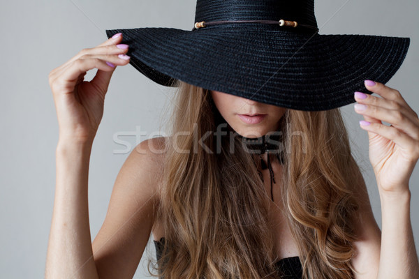 beautiful girl in a hat with a brim fashion Stock photo © dmitriisimakov