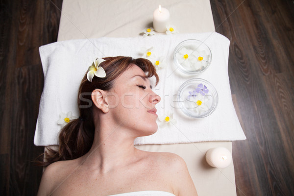 the beautiful girl lying in Spa massage sauna Stock photo © dmitriisimakov