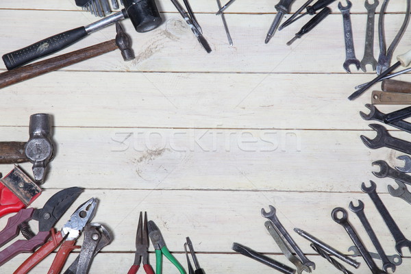 construction hammers screwdriver repair tool pliers on the boards Stock photo © dmitriisimakov