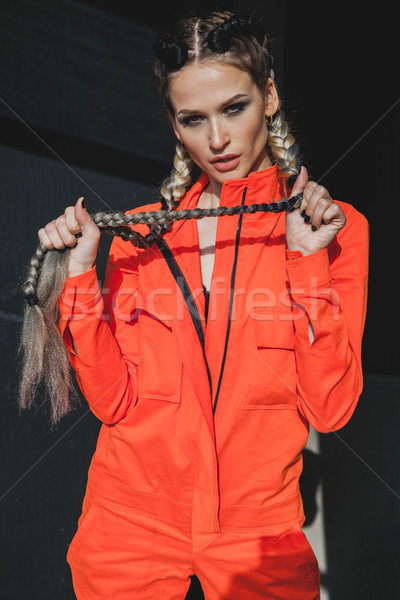 woman with colorful braids in working clothes Stock photo © dmitriisimakov