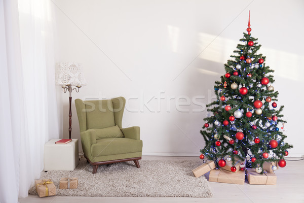 Christmas tree in a white room on new year's Eve Stock photo © dmitriisimakov