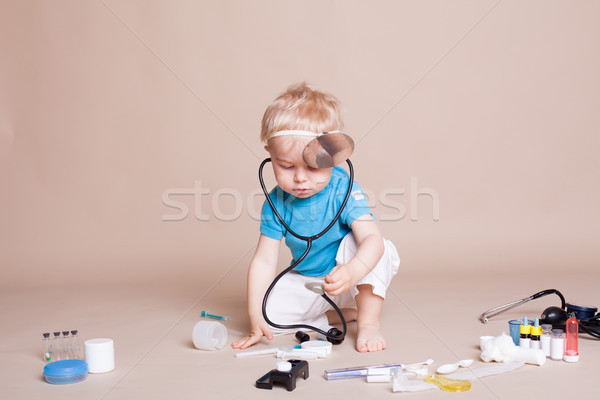 a boy plays in doctor medicine hospital Stock photo © dmitriisimakov