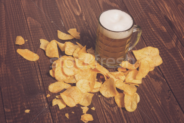 The beer and crunchy chips Stock photo © dmitroza