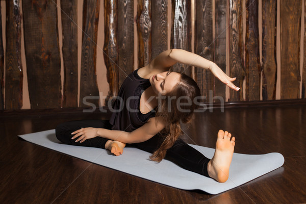 Woman is doing tilts Stock photo © dmitroza