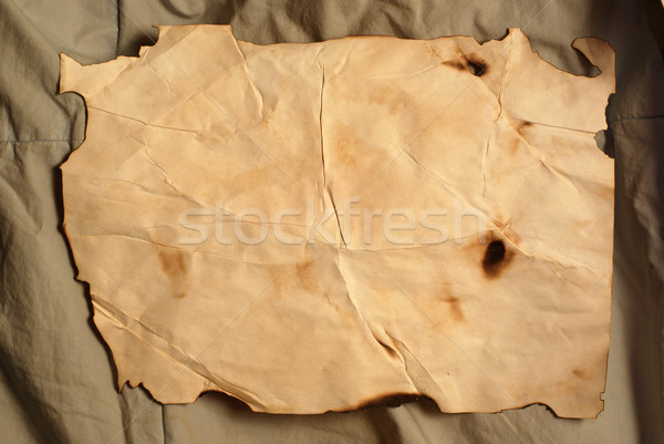 old natural beige paper with fracture on the canvas Stock photo © dmitroza