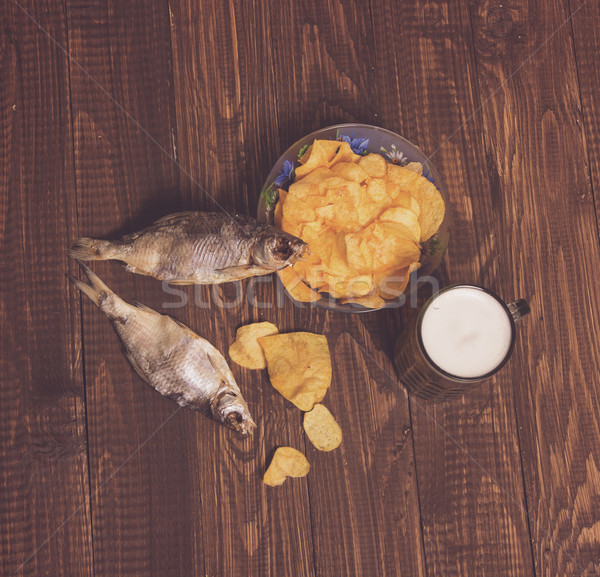 Beer with crunchy chips and fish Stock photo © dmitroza