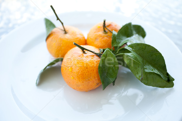 Fresh orange mandarines Stock photo © dmitroza