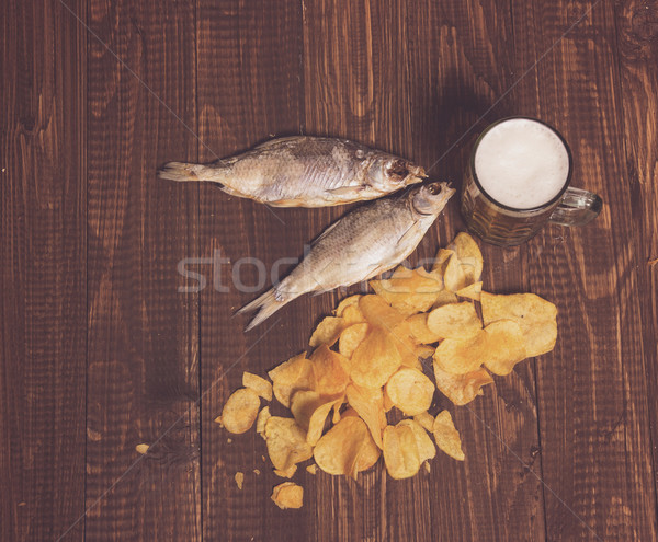 Chips, beer and two fishes Stock photo © dmitroza