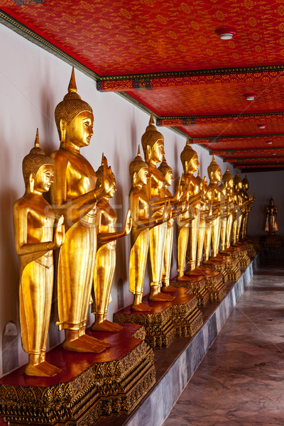 Standing Buddha statues. Thailand Stock photo © dmitry_rukhlenko