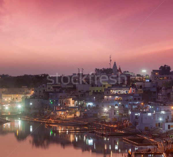 Sacred Puskhar lake (Sagar) and ghats of  town Pushkar in twilig Stock photo © dmitry_rukhlenko