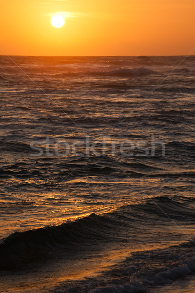 Oceaan zonsondergang groot zon strand zee Stockfoto © dmitry_rukhlenko