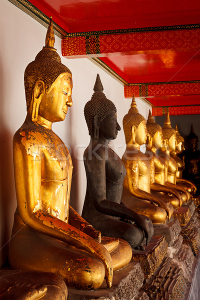 Stock photo: Sitting Buddha statues, Thailand