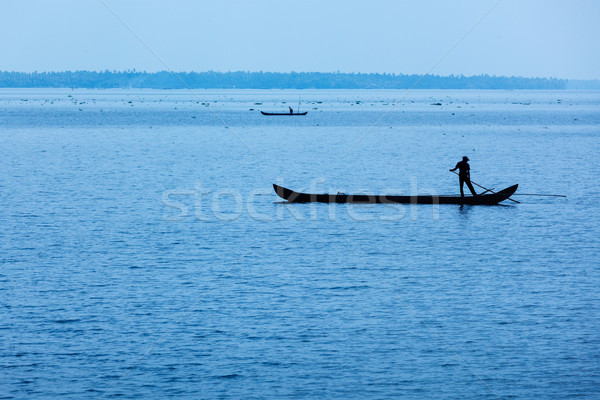 Man on boat. Kerala, India Stock photo © dmitry_rukhlenko