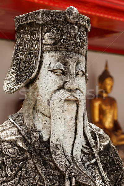 Wat Pho stone guardian face close up, Thailand Stock photo © dmitry_rukhlenko