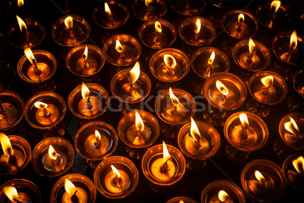 Brucia candele tempio fuoco chiesa Foto d'archivio © dmitry_rukhlenko