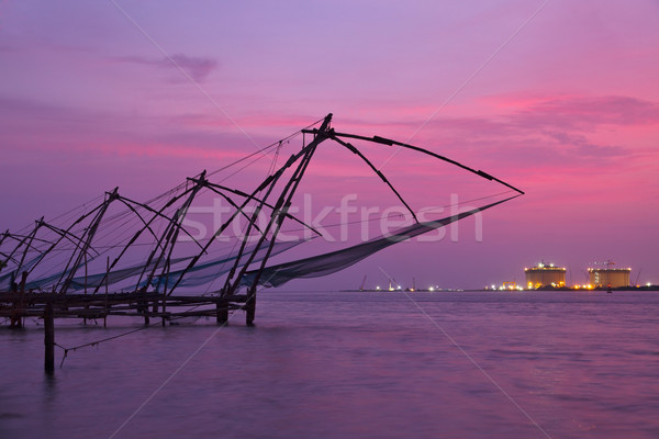 Chinese fishnets on sunset. Kochi, Kerala, India Stock photo © dmitry_rukhlenko