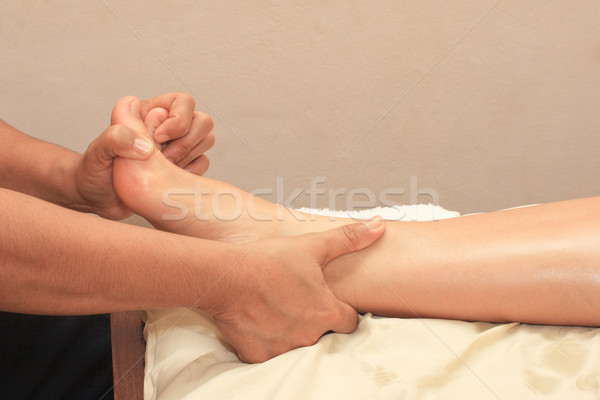 Foot massage Stock photo © dmitry_rukhlenko