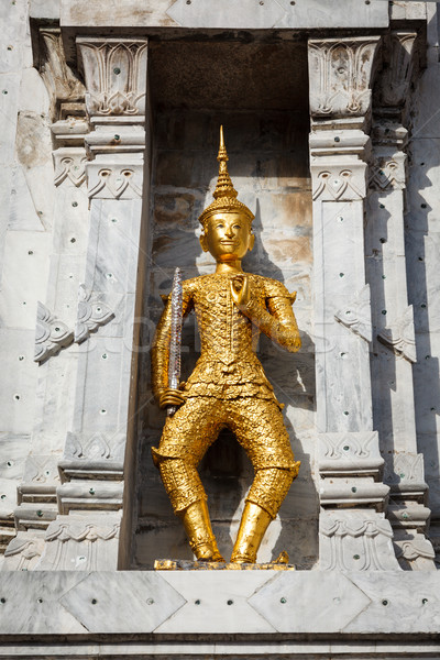 Gold guard on tower, Wat Phi, Thailand Stock photo © dmitry_rukhlenko