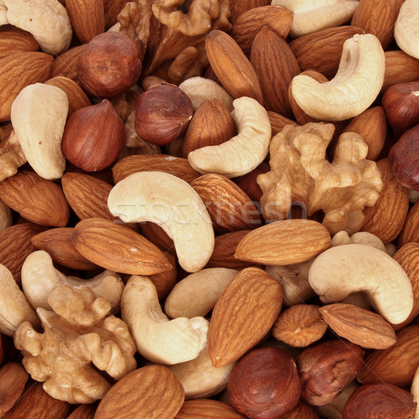 Assorted nuts (almonds, filberts, walnuts, cashews) close up Stock photo © dmitry_rukhlenko