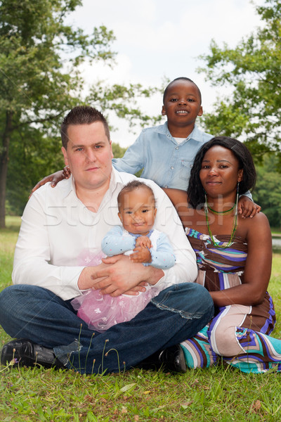 Mixed family in the park Stock photo © DNF-Style