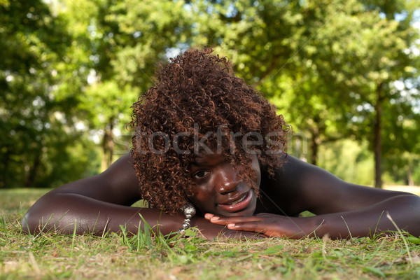 Black teenage girl on the grass Stock photo © DNF-Style