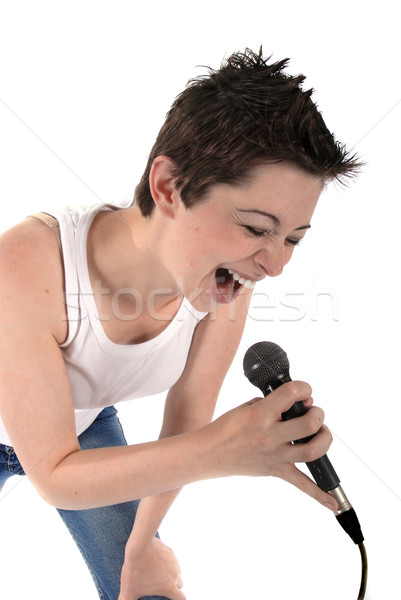 Vrouw zingen microfoon mooie vrouw geïsoleerd witte Stockfoto © dnsphotography