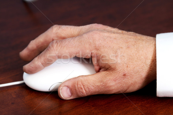 Hand muis ouderen bureau Stockfoto © dnsphotography