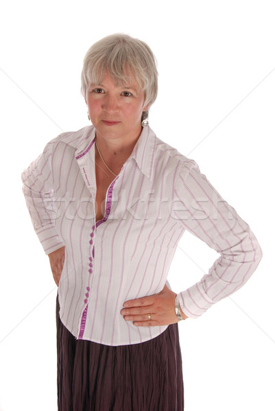 серьезный деловой женщины рук бедра старший деловая женщина Сток-фото © dnsphotography