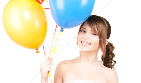 Stock photo: happy teenage girl with balloons