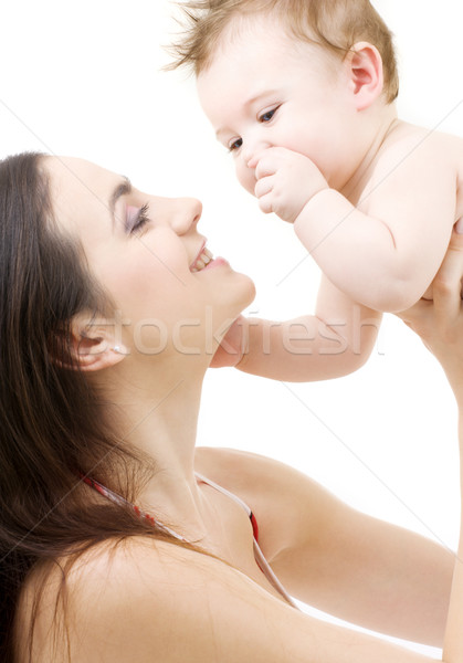 嬰兒 母親 手 圖片 快樂 白 商業照片 © dolgachov