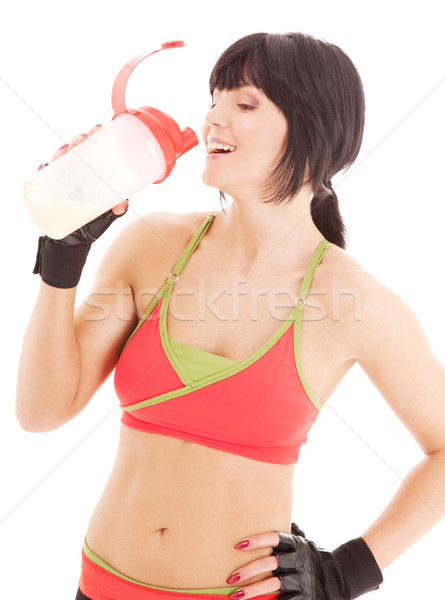 Fitnessz oktató fehérje shake üveg nő Stock fotó © dolgachov