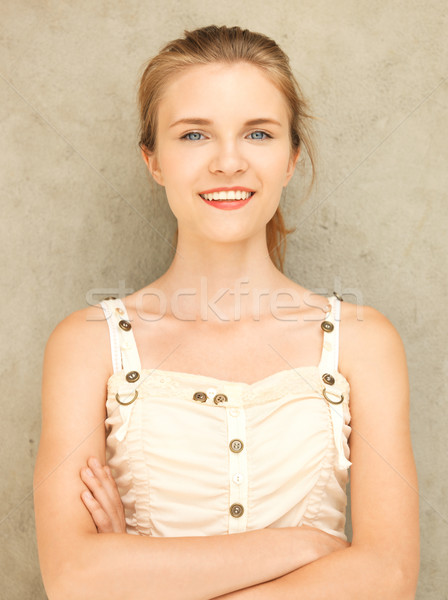 happy and smiling teenage girl Stock photo © dolgachov