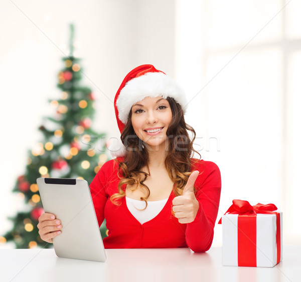 woman with gift box and tablet pc computer Stock photo © dolgachov