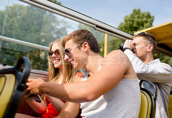 Stockfoto: Glimlachend · paar · boek · tour · bus