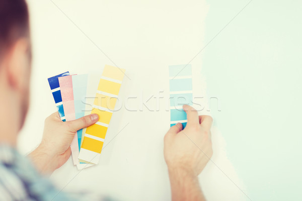 close up of male wit color pallets Stock photo © dolgachov