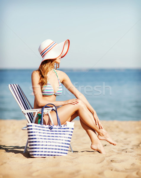 女孩 日光浴 夏天 假期 假期 商業照片 © dolgachov