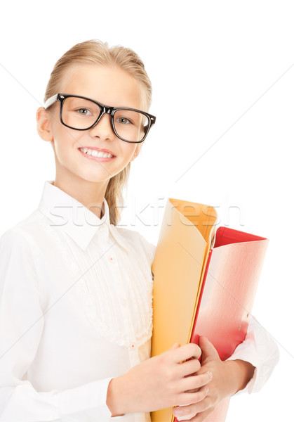 elementary school student with folders Stock photo © dolgachov